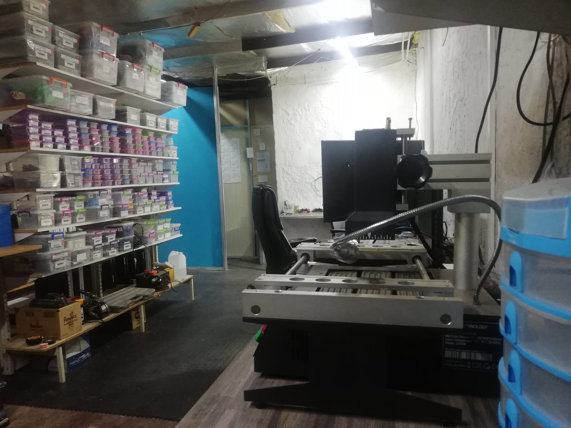 PS5 on repair workbench with diagnostic tools - professional console repair